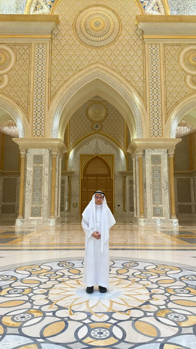 Standing in a white kandura at the centre of the marble hall of the Abu Dhabi presidential palace, under its gilded arches.